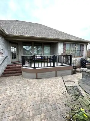 Raised deck with black metal railings