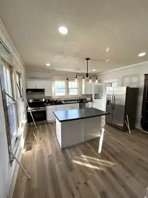 Modern kitchen remodel with island and custom cabinets