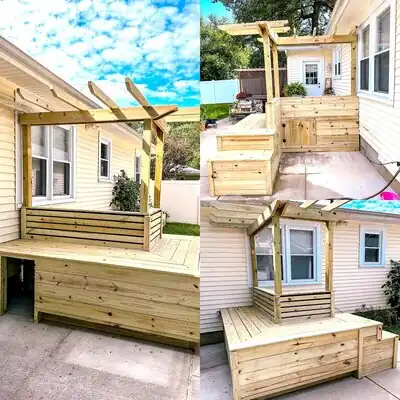 Backyard wooden deck with pergola and built-in benches attached to beige house in Murray, KY